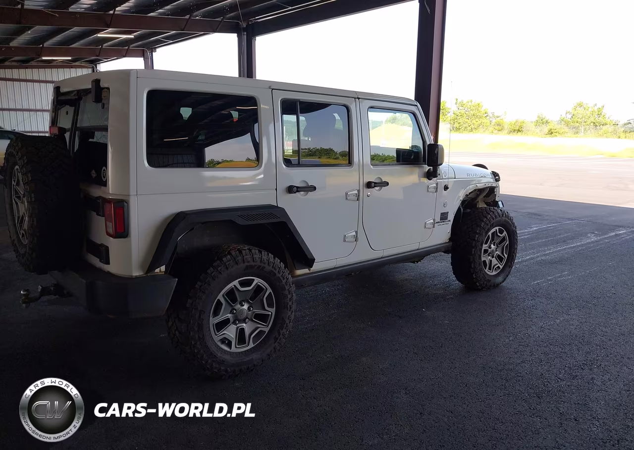 2015 Jeep Wrangler Unlimited Rubicon VIN:1C4BJWFG9FL531217 - 4