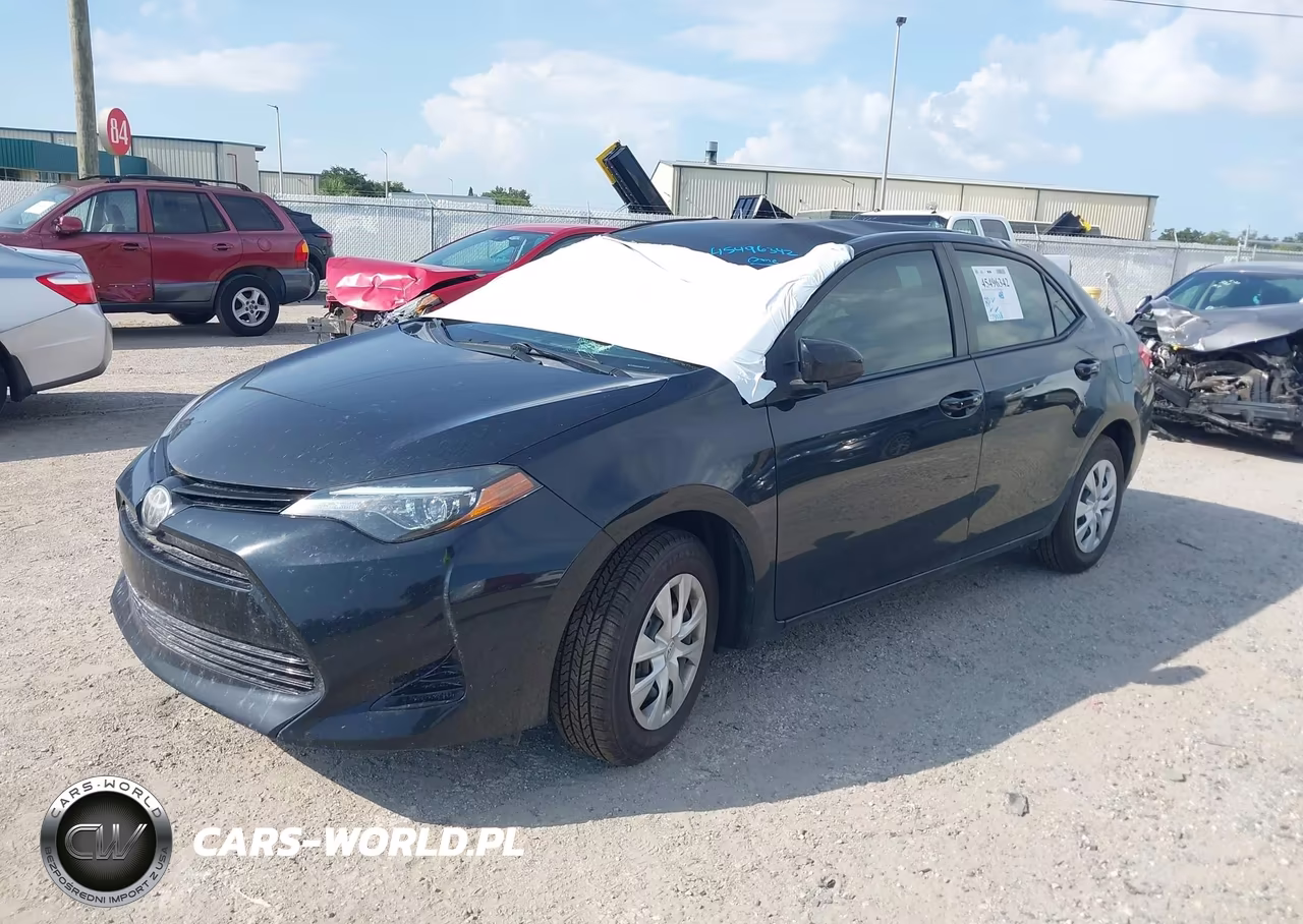 2018 Toyota Corolla L VIN:5YFBURHE9JP851044 - 2