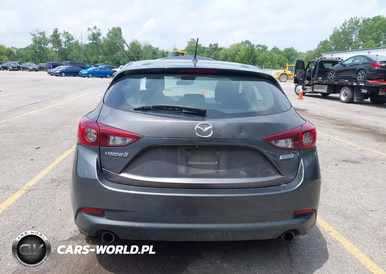 2018 Mazda Mazda3 Touring VIN:3MZBN1L31JM209040 - 16