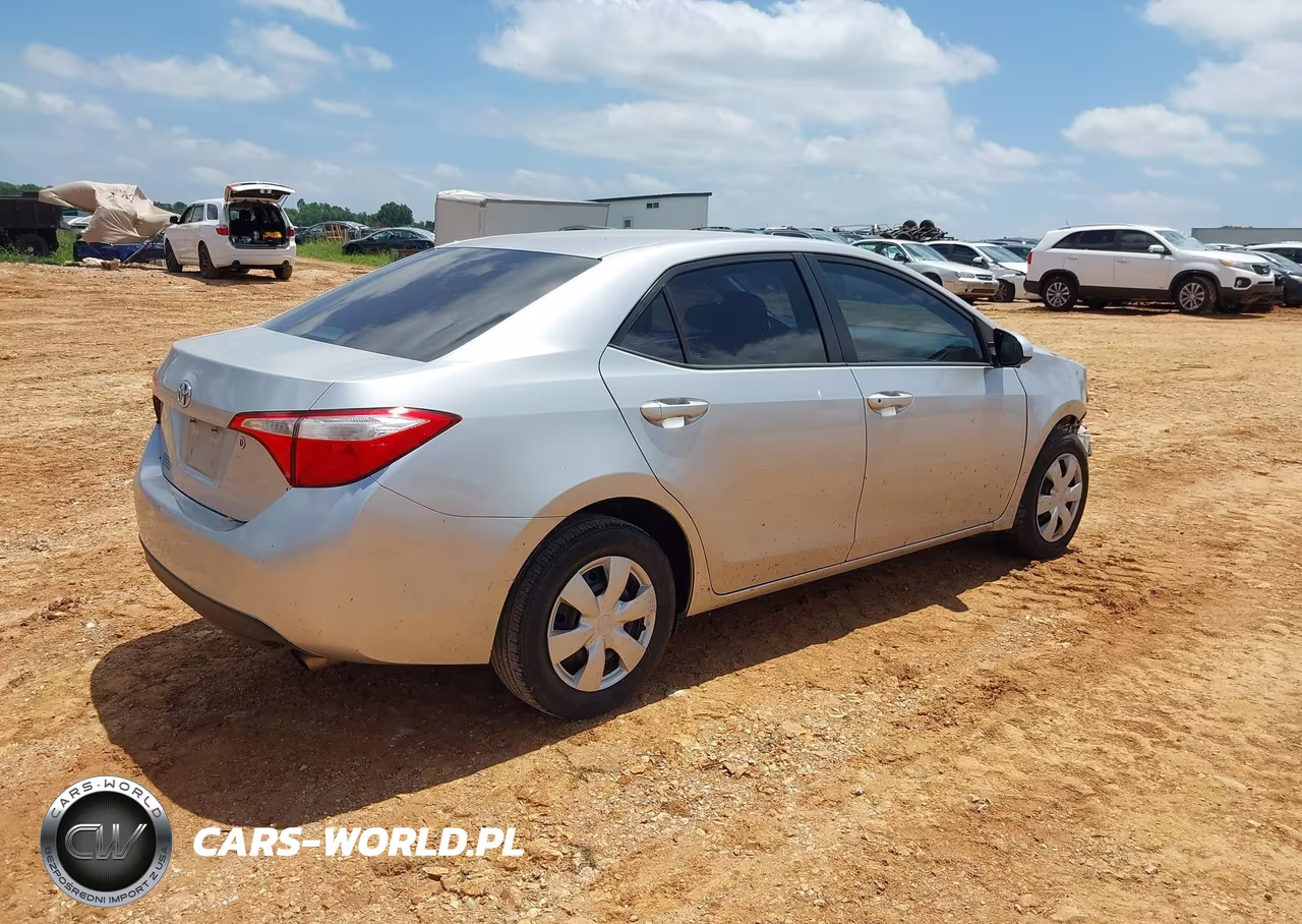 2015 Toyota Corolla L VIN:5YFBURHE7FP336132 - 4
