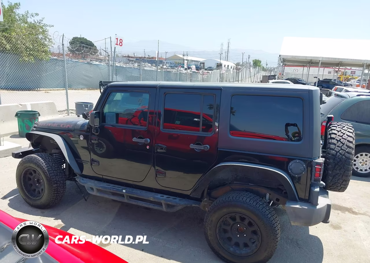 2013 Jeep Wrangler Unlimited Rubicon VIN:1C4BJWFG2DL699603 - 13