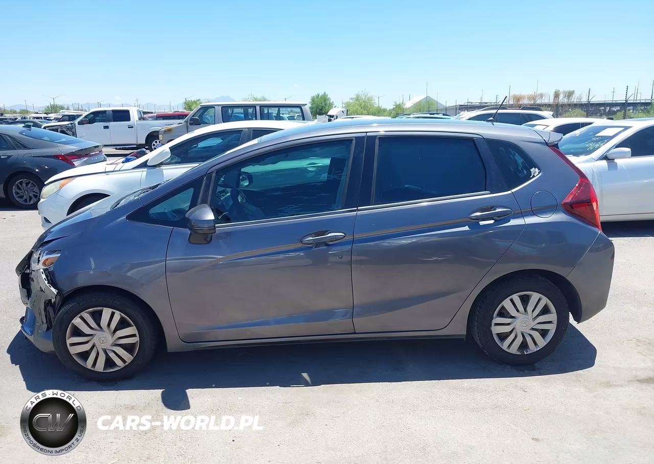 2015 Honda Fit Lx VIN:3HGGK5H59FM717252 - 14