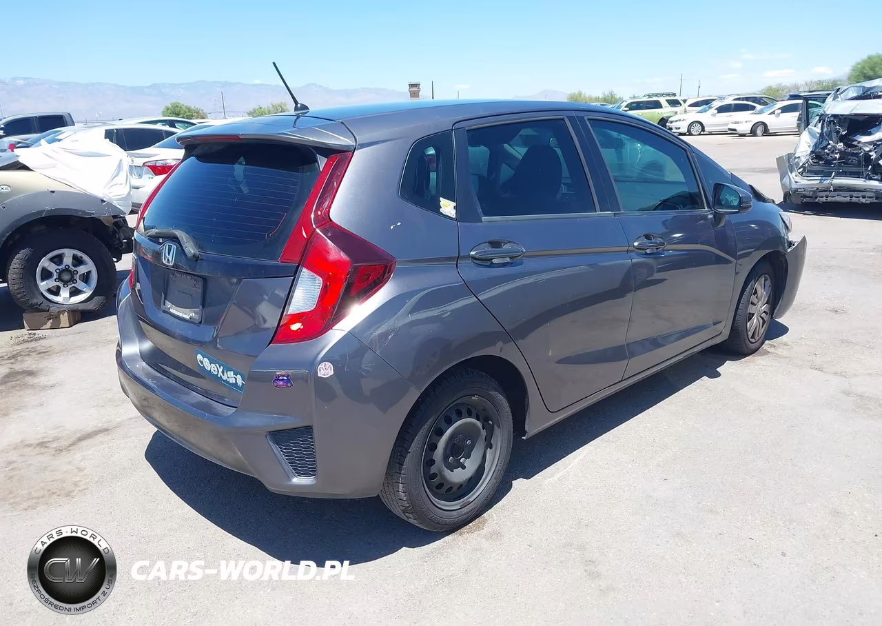 2015 Honda Fit Lx VIN:3HGGK5H59FM717252 - 4