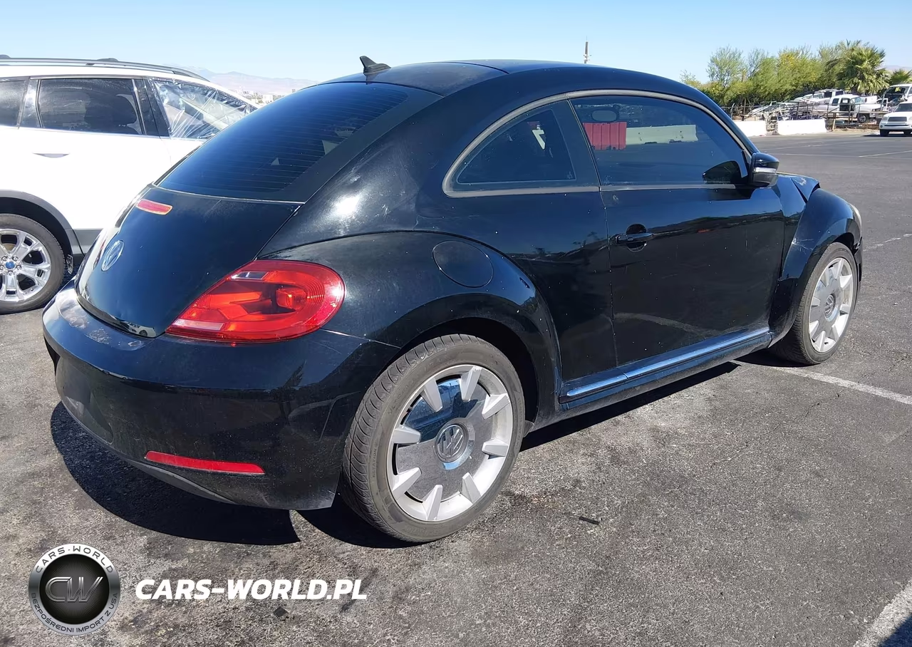 2012 Volkswagen Beetle 2.5L VIN:3VWJP7AT0CM629189 - 4