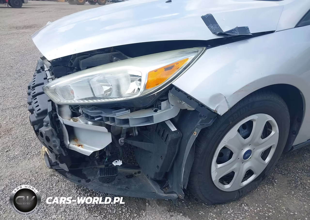 2015 Ford Focus S VIN:1FADP3E27FL264256 - 18
