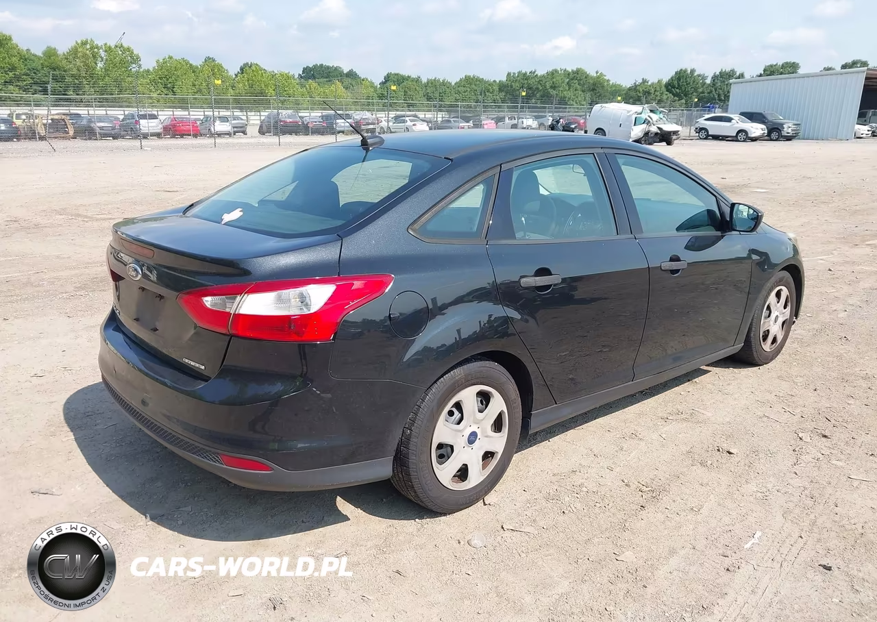 2014 Ford Focus S VIN:1FADP3E25EL451705 - 4