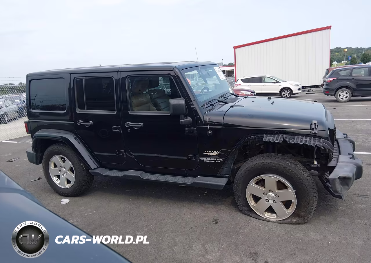 2011 Jeep Wrangler Unlimited Sahara VIN:1J4HA5H19BL562436 - 13
