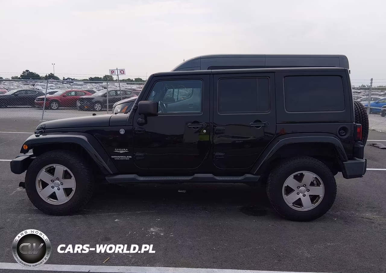 2011 Jeep Wrangler Unlimited Sahara VIN:1J4HA5H19BL562436 - 14