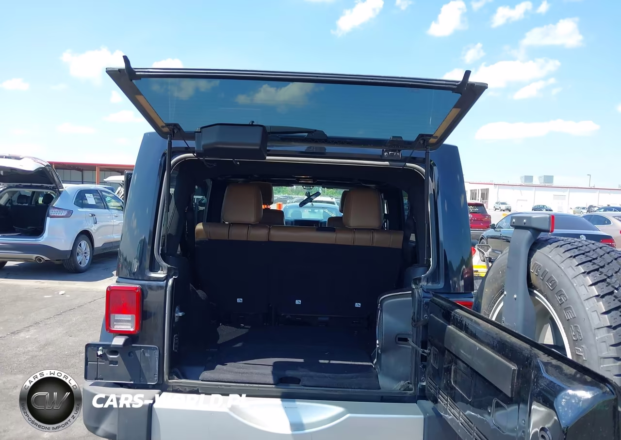 2011 Jeep Wrangler Unlimited Sahara VIN:1J4HA5H19BL562436 - 17