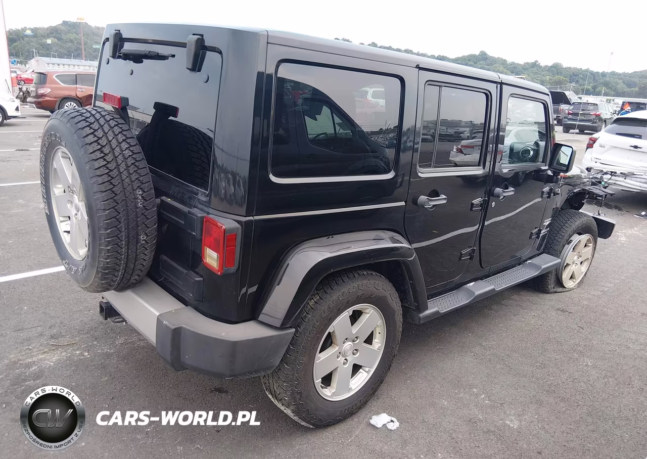 2011 Jeep Wrangler Unlimited Sahara VIN:1J4HA5H19BL562436 - 4