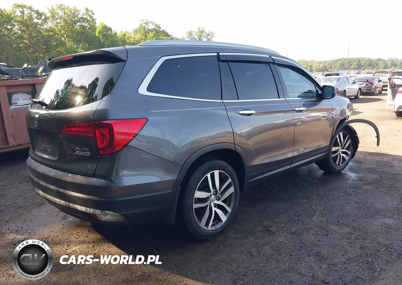 2017 Honda Pilot Elite VIN:5FNYF6H03HB056441 - 4