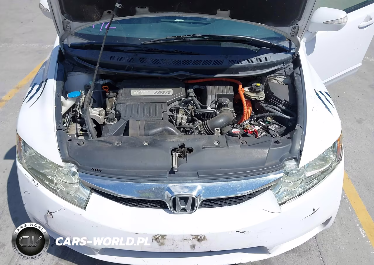 2010 Honda Civic Hybrid VIN:JHMFA3F28AS007560 - 10