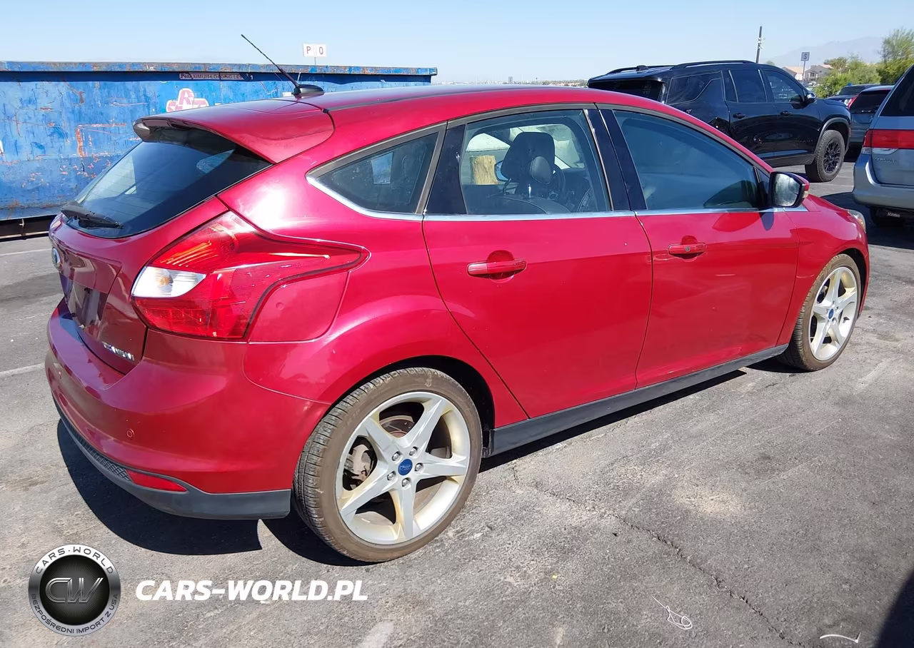 2012 Ford Focus Titanium VIN:1FAHP3N23CL309240 - 4