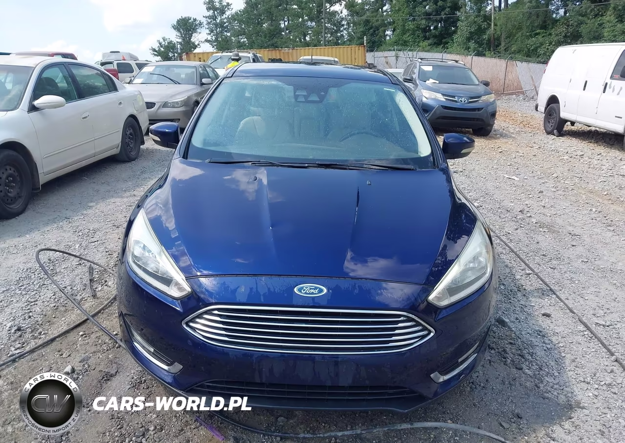 2016 Ford Focus Titanium VIN:1FADP3N26GL273743 - 12