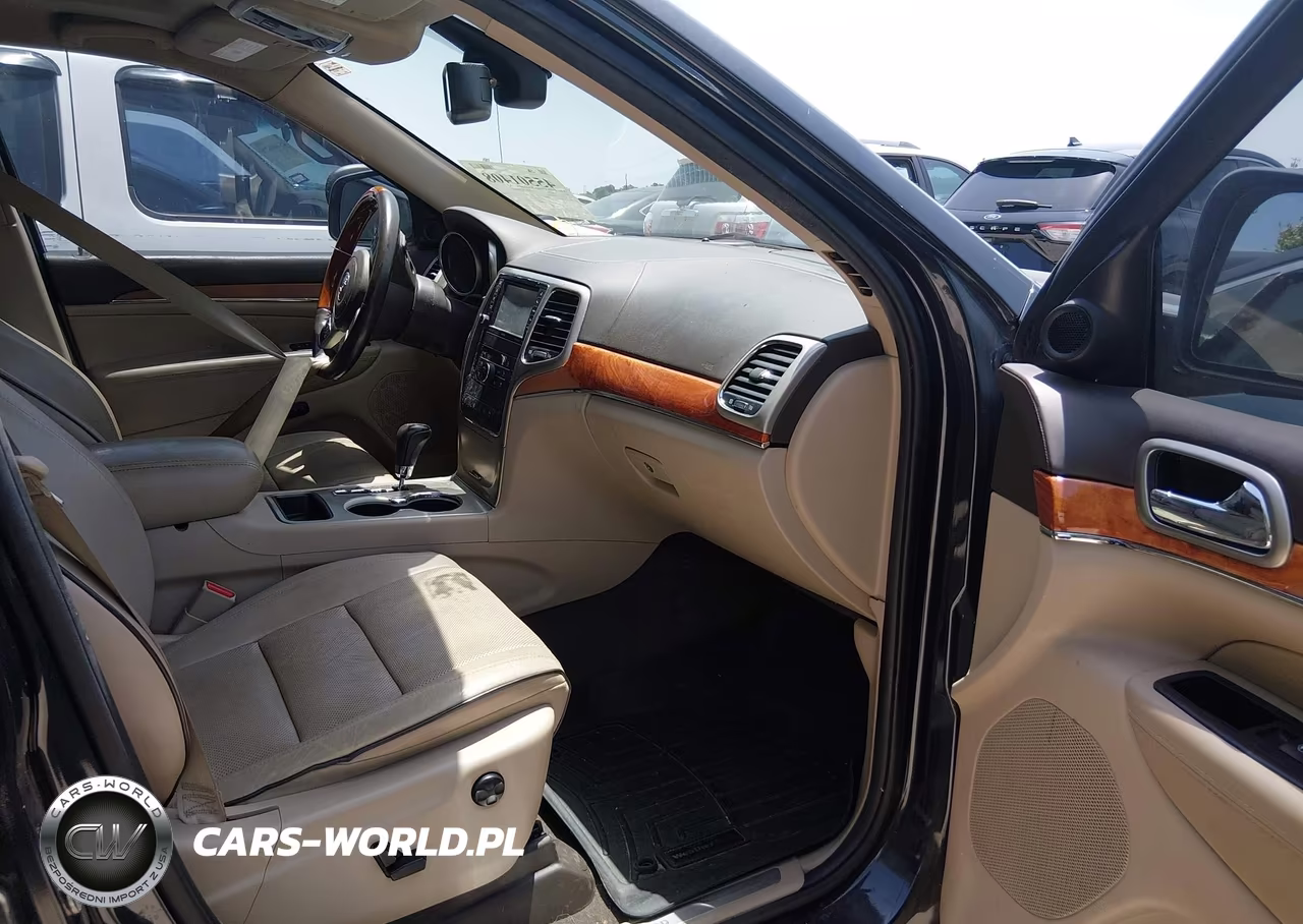 2012 Jeep Grand Cherokee Overland VIN:1C4RJECG3CC264858 - 5