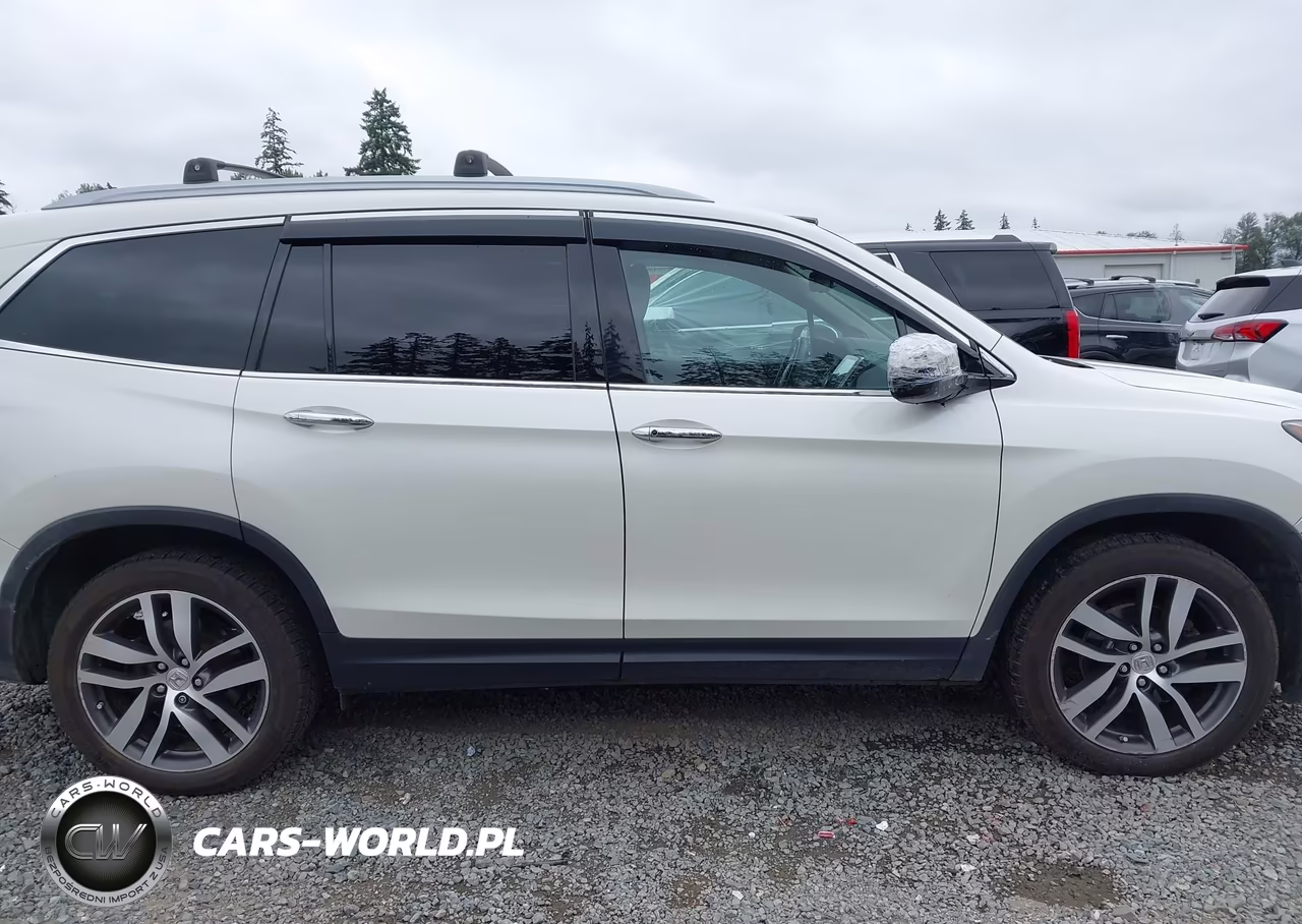 2016 Honda Pilot Elite VIN:5FNYF6H00GB064009 - 14