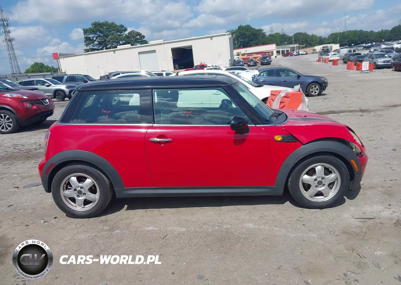 2009 Mini Cooper VIN:WMWMF33519TW72876 - 13