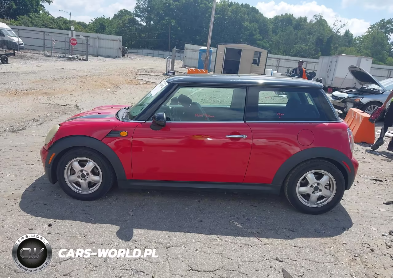 2009 Mini Cooper VIN:WMWMF33519TW72876 - 14