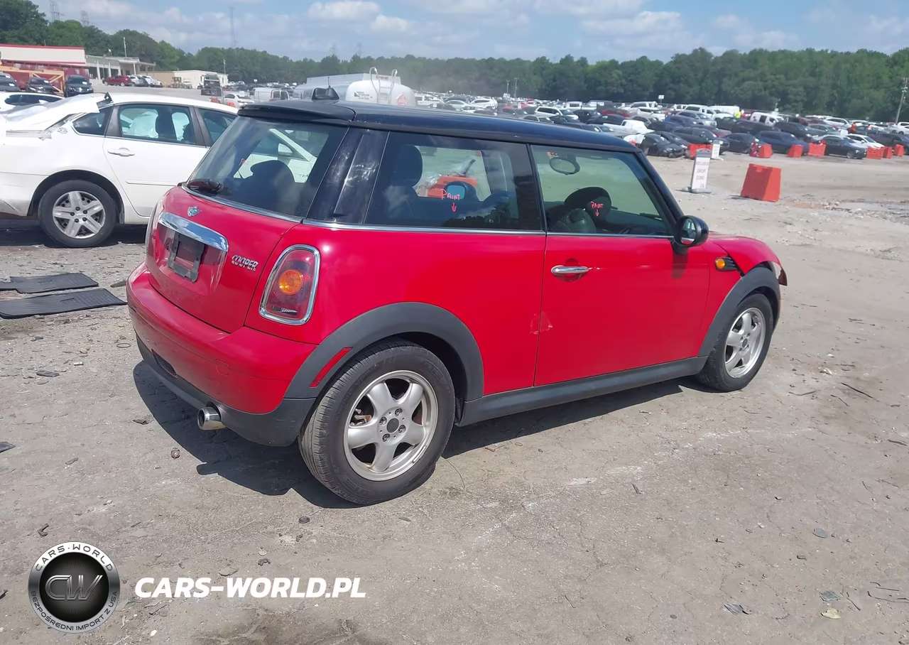 2009 Mini Cooper VIN:WMWMF33519TW72876 - 4