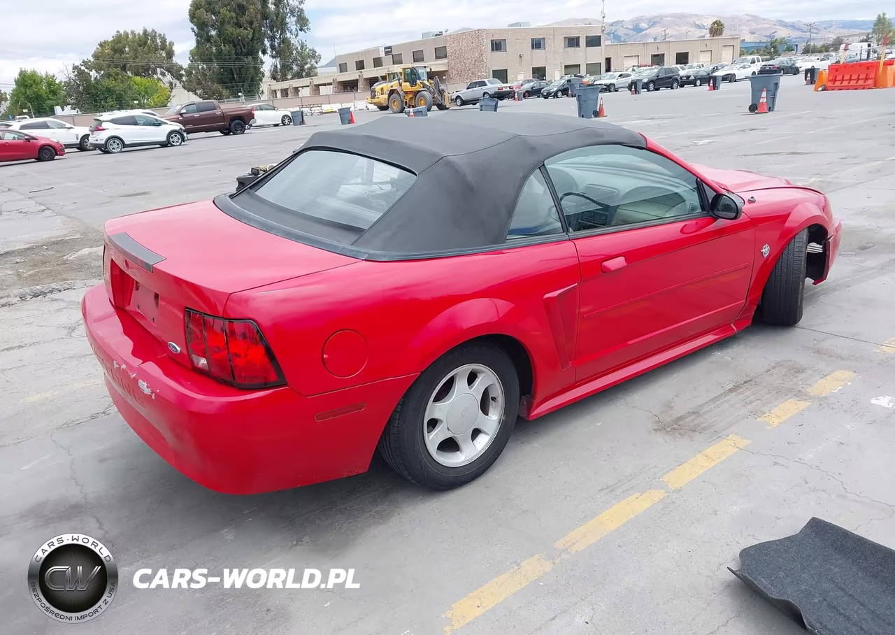 1999 Ford Mustang VIN:1FAFP4446XF144711 - 4