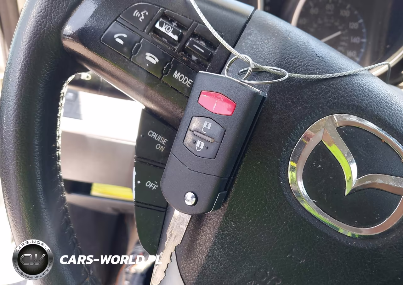 2012 Mazda Mazda3 I Touring VIN:JM1BL1L71C1611605 - 11