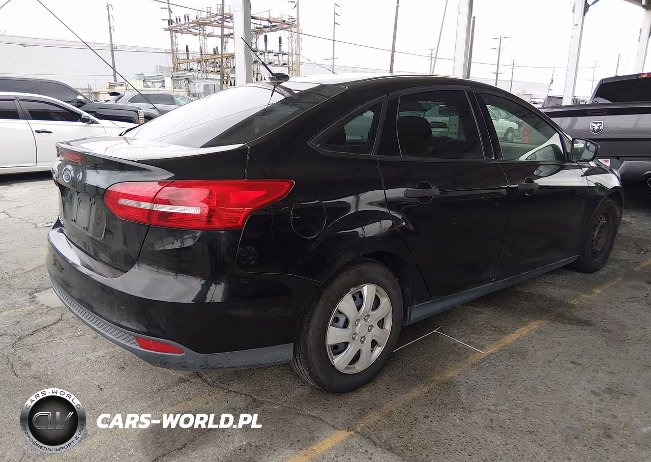 2017 Ford Focus S VIN:1FADP3E22HL325211 - 4