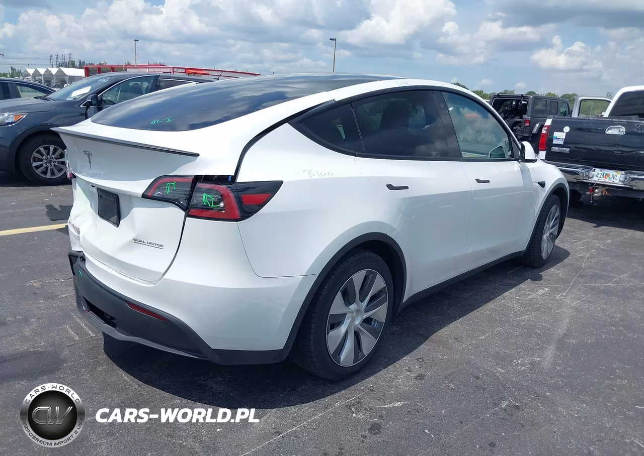 2023 Tesla Model Y Performance Dual Motor All-Wheel Drive VIN:7SAYGDEF6PA049086 - 4