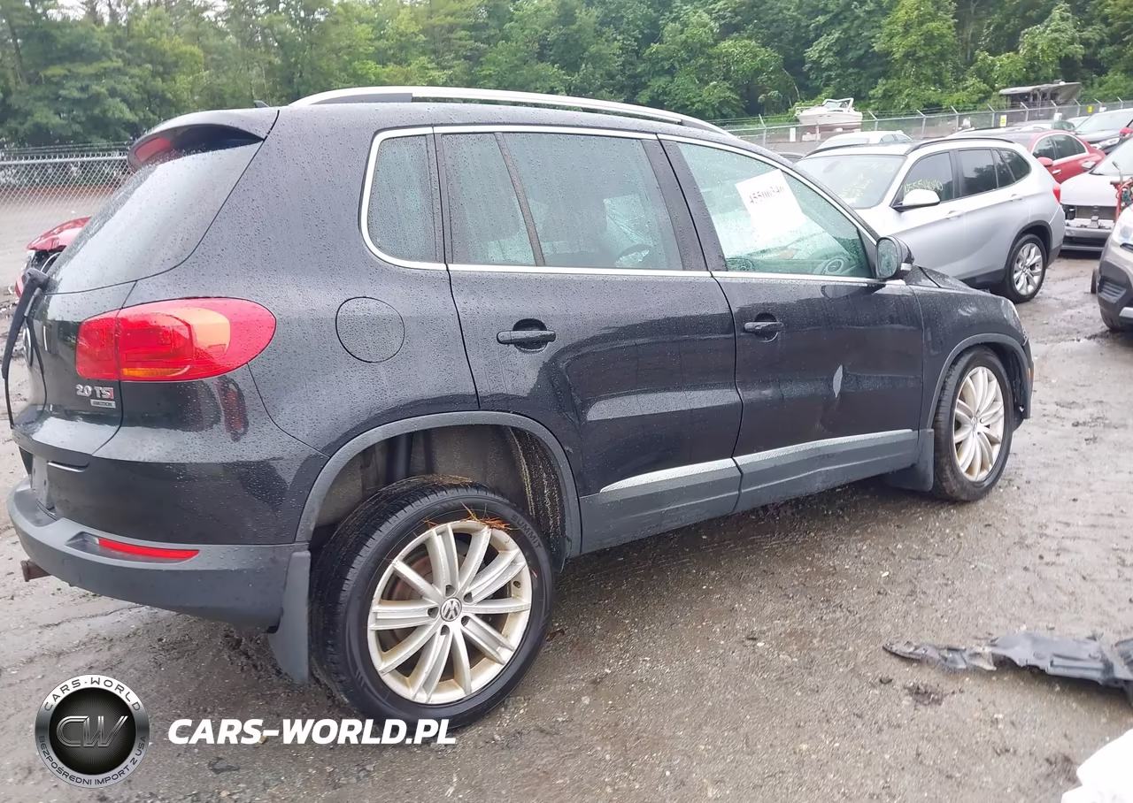 2014 Volkswagen Tiguan Sel VIN:WVGBV3AX3EW611664 - 4