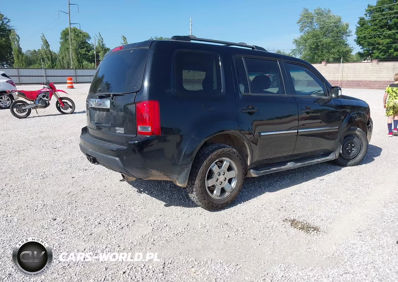 2010 Honda Pilot Touring VIN:5FNYF4H90AB030579 - 4