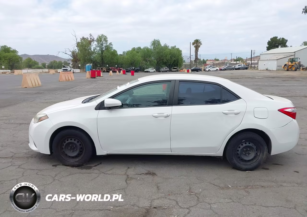 2015 Toyota Corolla L VIN:5YFBURHE7FP194106 - 14