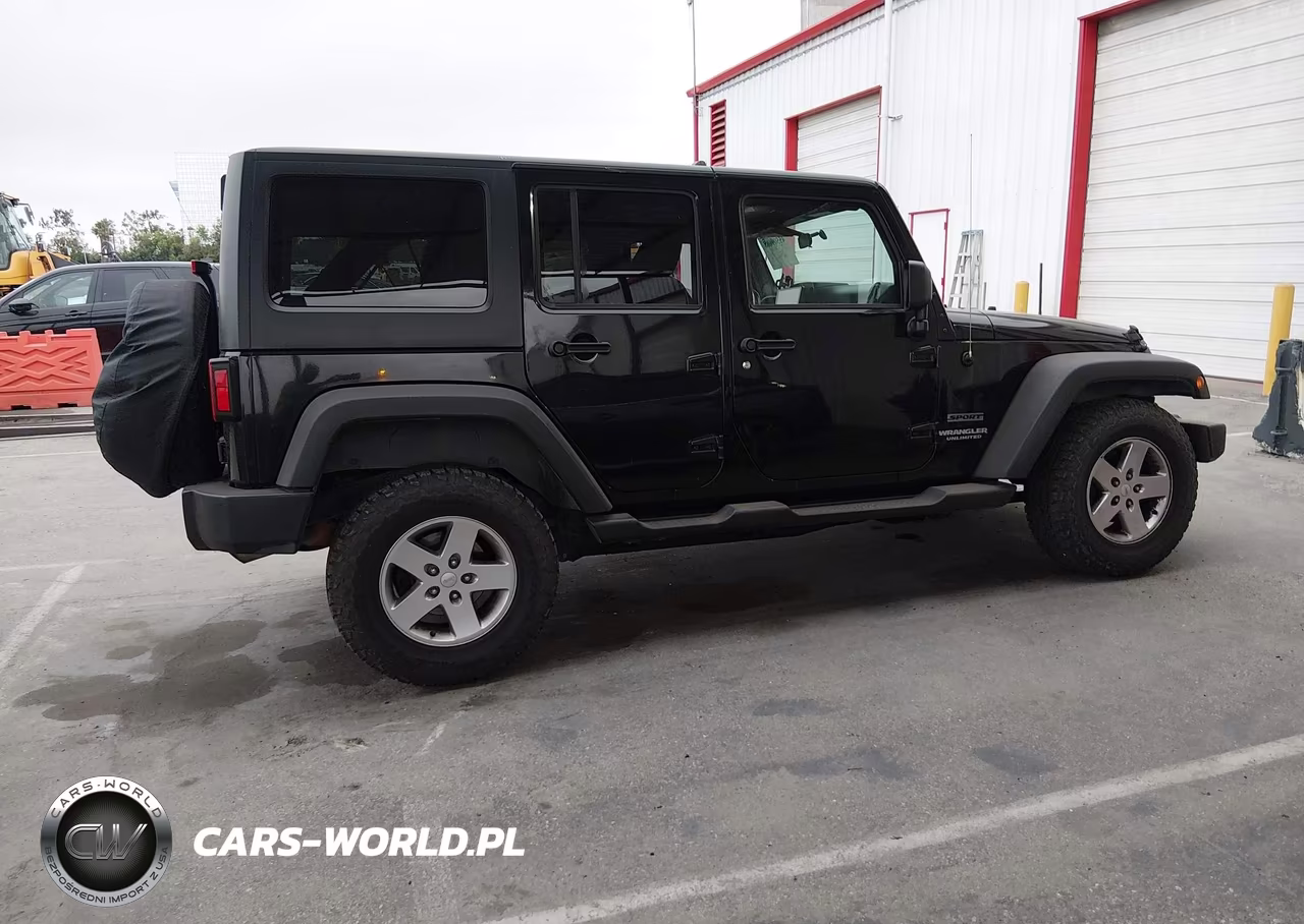 2012 Jeep Wrangler Unlimited Sport VIN:1C4BJWDG1CL266730 - 13