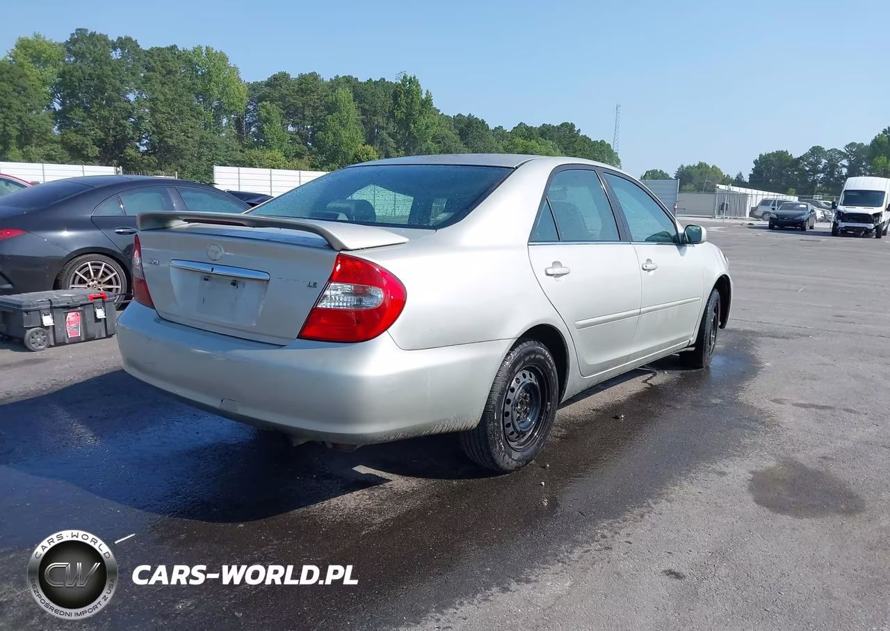 2002 Toyota Camry Le VIN:4T1BE32KX2U087052 - 4