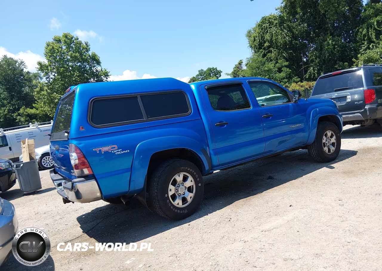 2011 Toyota Tacoma Base V6 VIN:3TMLU4ENXBM074619 - 4