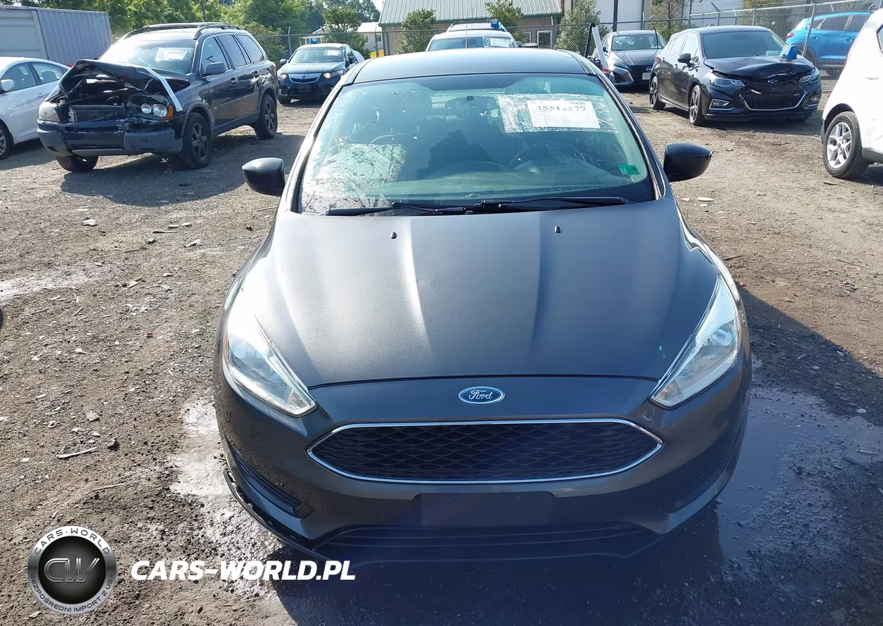 2016 Ford Focus S VIN:1FADP3E23GL402876 - 12