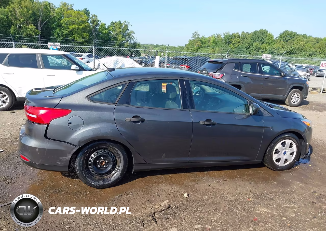 2016 Ford Focus S VIN:1FADP3E23GL402876 - 13