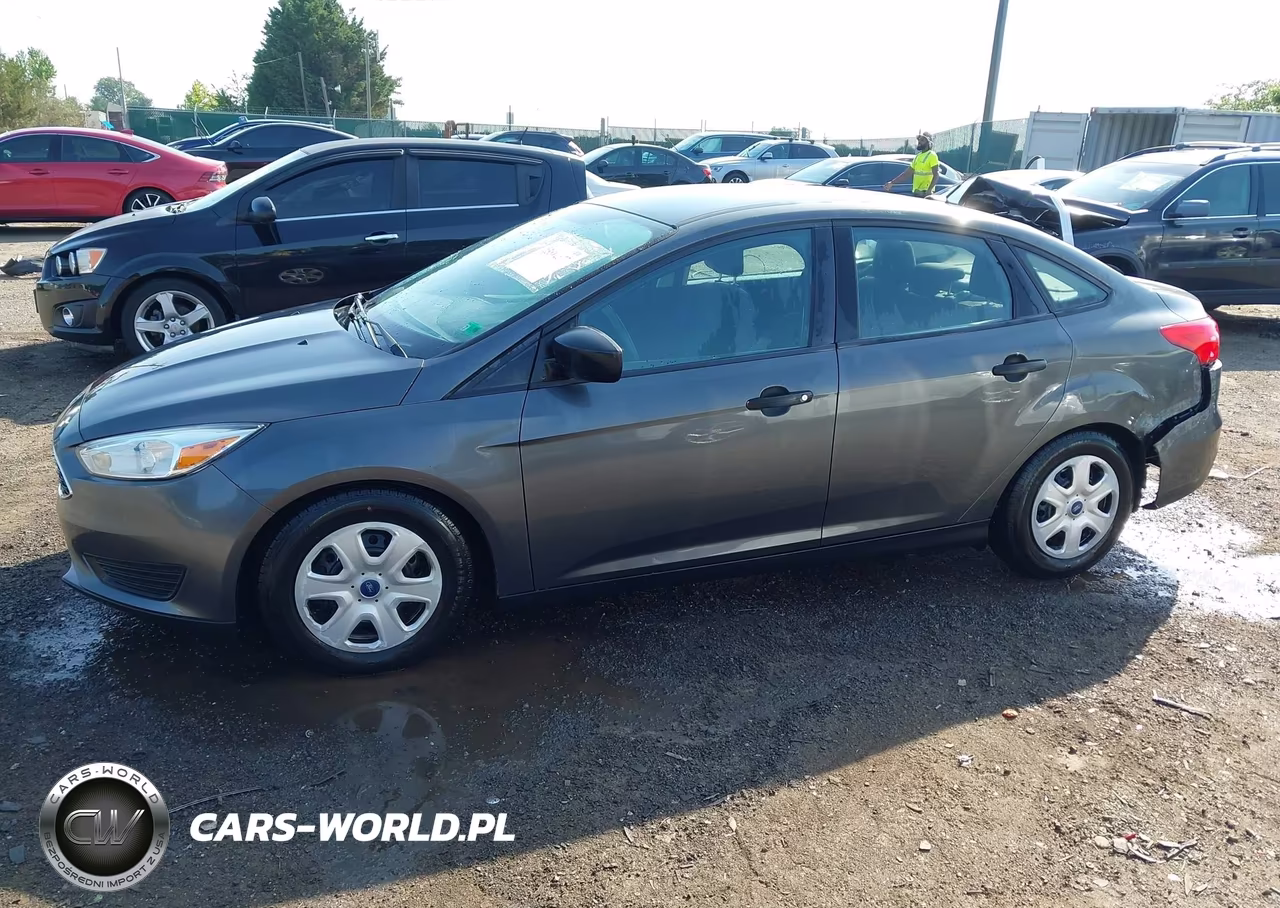 2016 Ford Focus S VIN:1FADP3E23GL402876 - 14