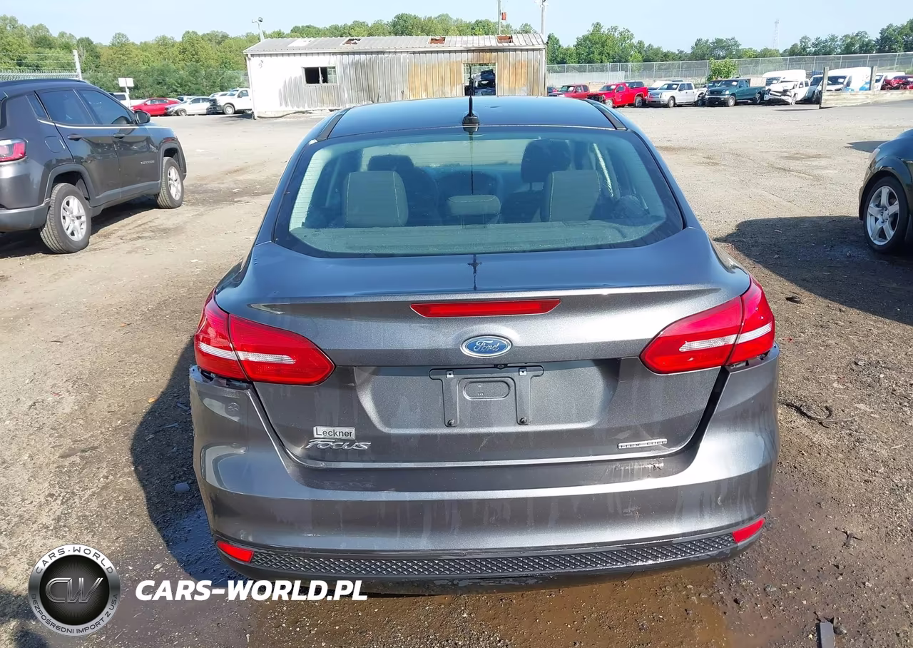 2016 Ford Focus S VIN:1FADP3E23GL402876 - 16