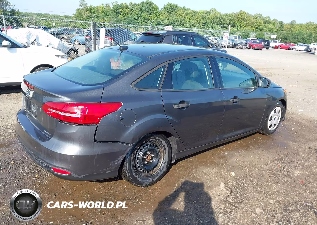 2016 Ford Focus S VIN:1FADP3E23GL402876 - 4