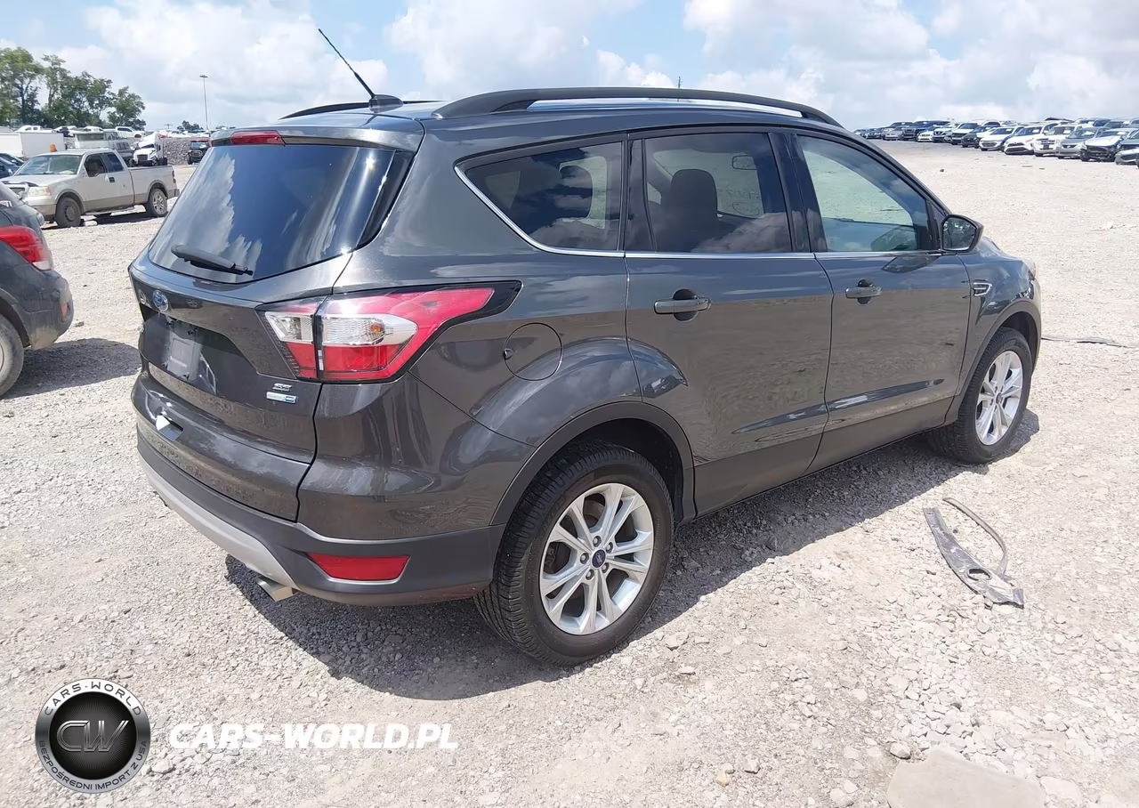 2018 Ford Escape Se VIN:1FMCU9GD2JUA60740 - 4