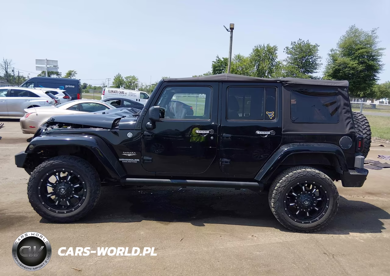 2012 Jeep Wrangler Unlimited Sahara VIN:1C4HJWEG5CL103751 - 14