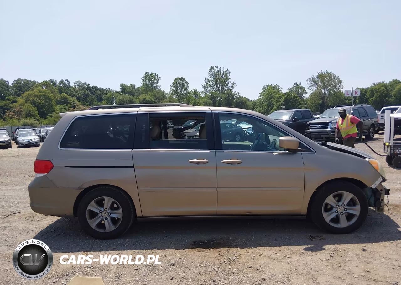 2010 Honda Odyssey Touring VIN:5FNRL3H92AB004928 - 14