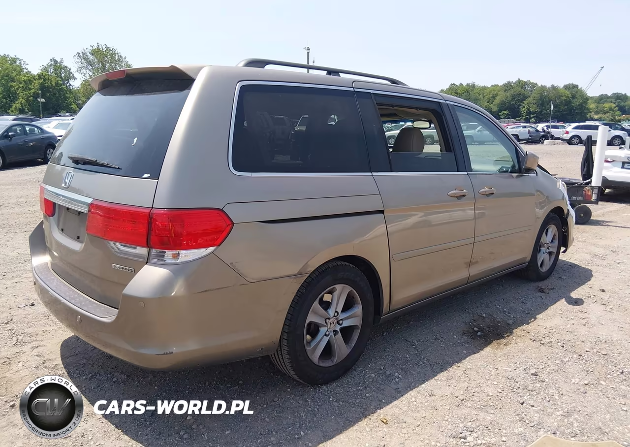 2010 Honda Odyssey Touring VIN:5FNRL3H92AB004928 - 4