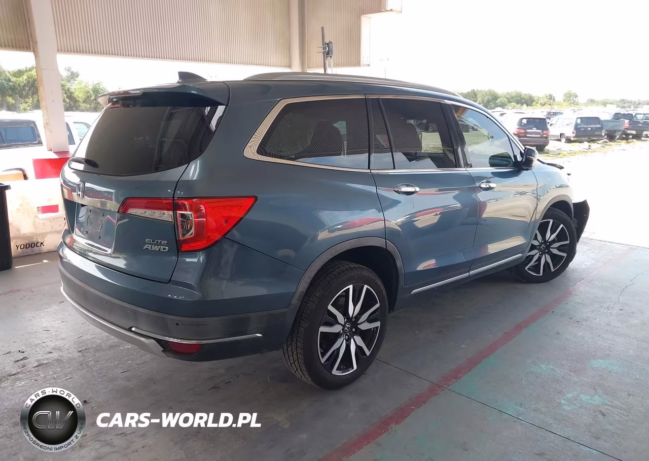 2019 Honda Pilot Elite VIN:5FNYF6H00KB014770 - 4