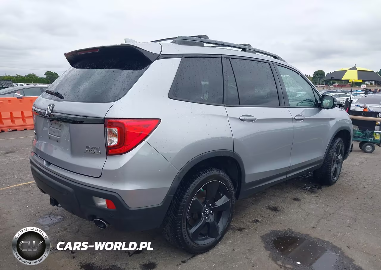 2019 Honda Passport Elite VIN:5FNYF8H0XKB002573 - 4