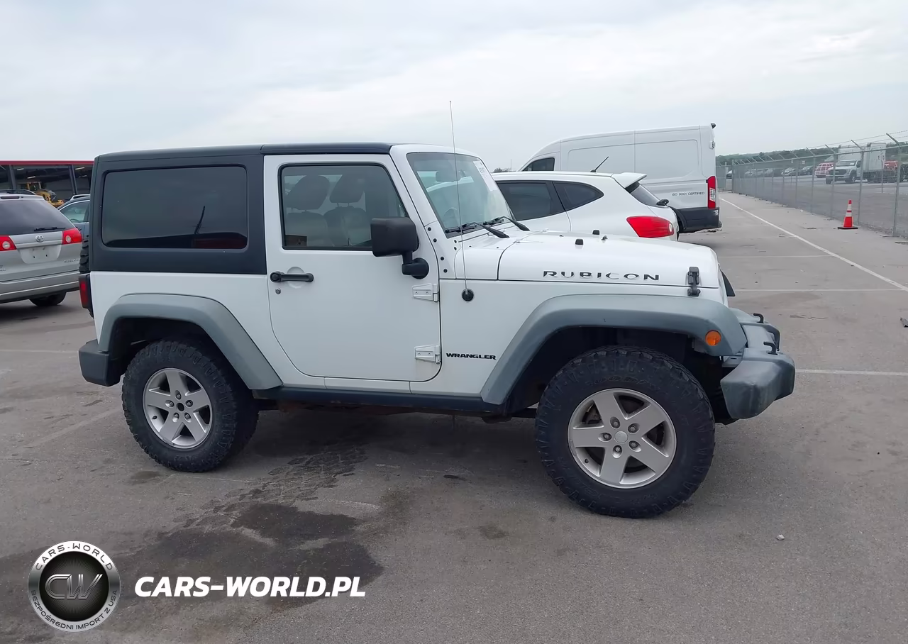 2011 Jeep Wrangler Rubicon VIN:1J4BA6D17BL546012 - 13
