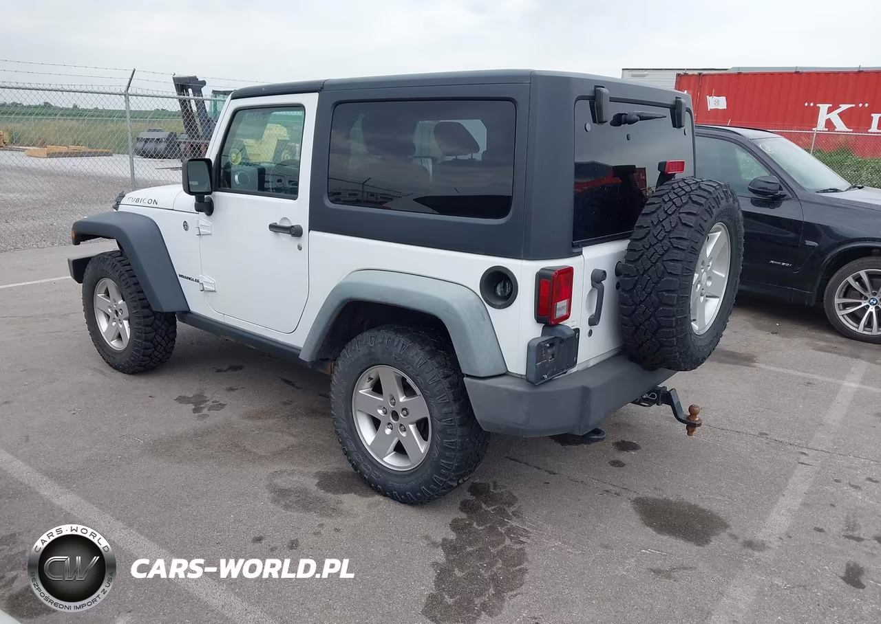 2011 Jeep Wrangler Rubicon VIN:1J4BA6D17BL546012 - 3