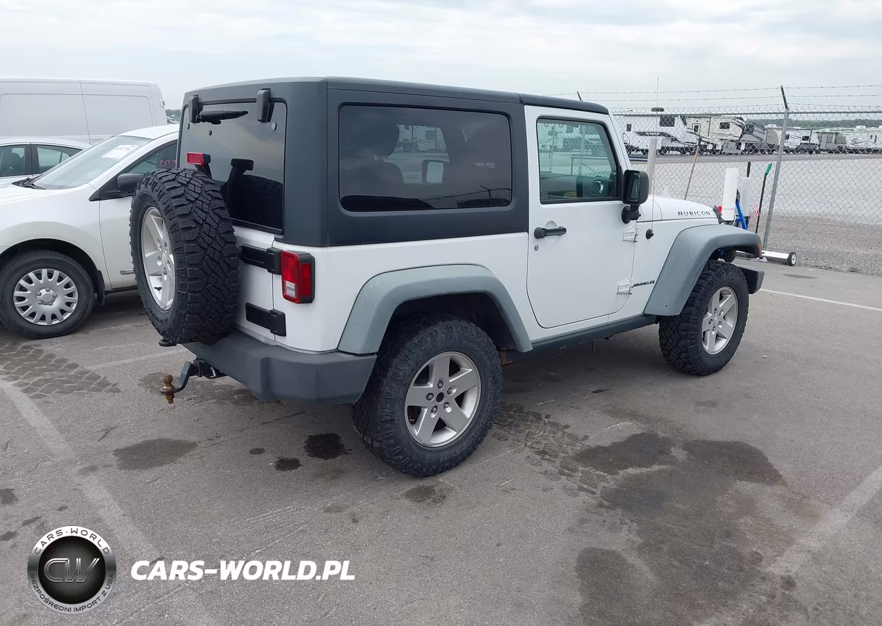 2011 Jeep Wrangler Rubicon VIN:1J4BA6D17BL546012 - 4
