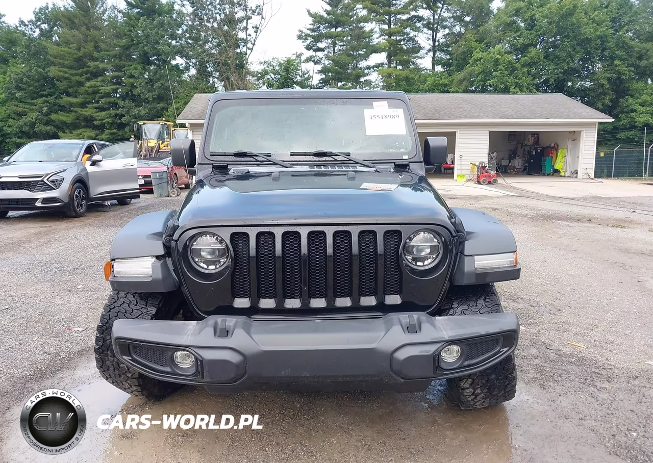 2022 Jeep Wrangler Unlimited High Tide 4X4 VIN:1C4HJXDG6NW235166 - 13
