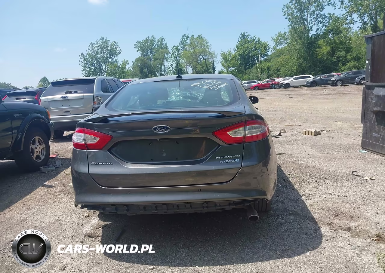 2015 Ford Fusion Hybrid Titanium VIN:3FA6P0RU1FR256495 - 16