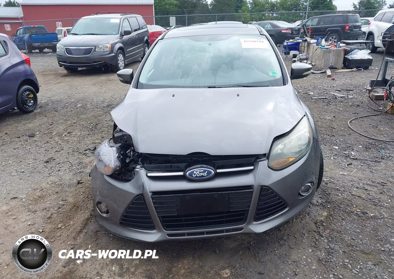 2013 Ford Focus Titanium VIN:1FADP3J27DL128972 - 12